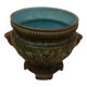 Old earthenware cachepot with woman decoration