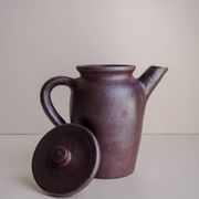 Brown ceramic artisan coffee maker