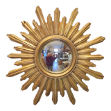 Sun mirror in golden resin from the 70s