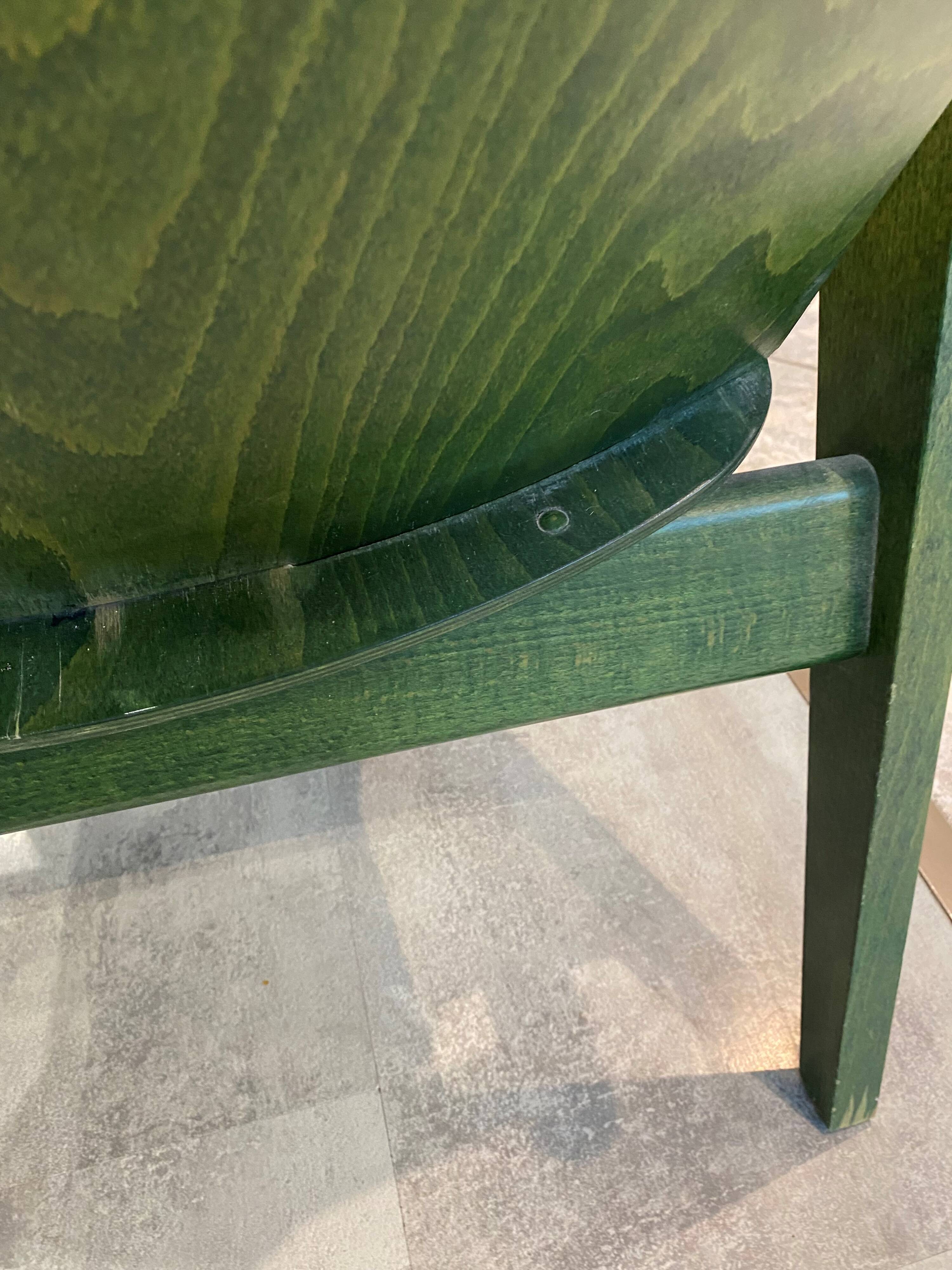 Fauteuil Baumann vert, années 70