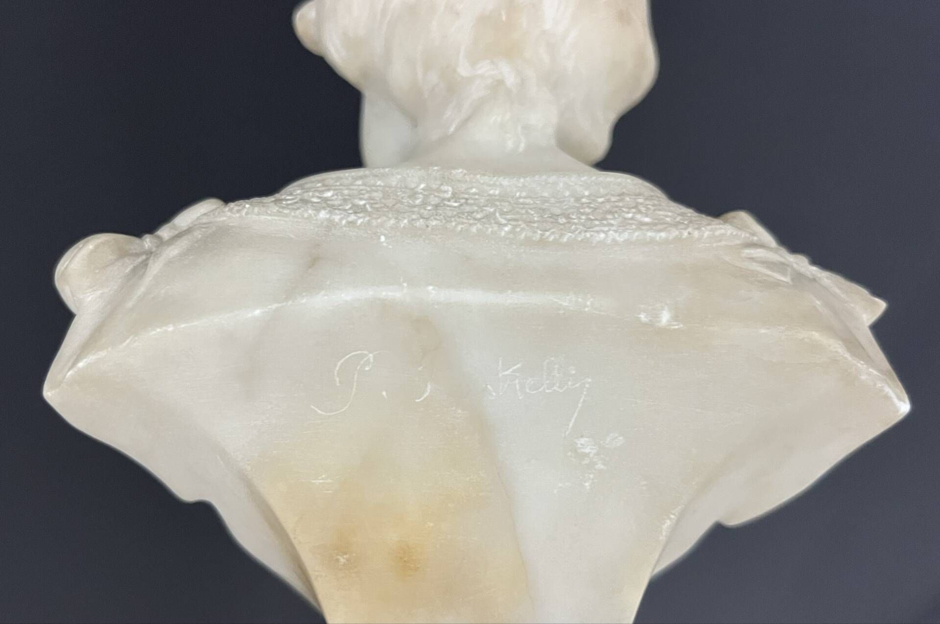 Bust of a young woman in carved alabaster – Art Nouveau style
