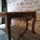 Louis XV style table in oak and cherry wood.
