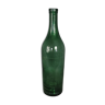 Old bottle in bubbled glass