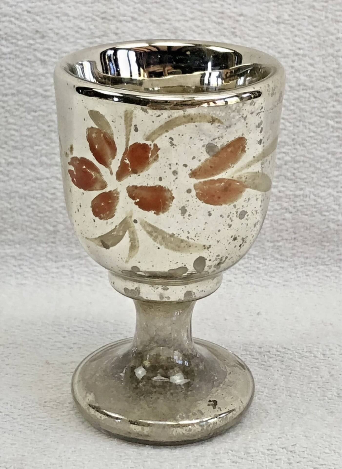 Painted blown glass egg cup with mercury gilding, 19th century.