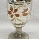 Painted blown glass egg cup with mercury gilding, 19th century.