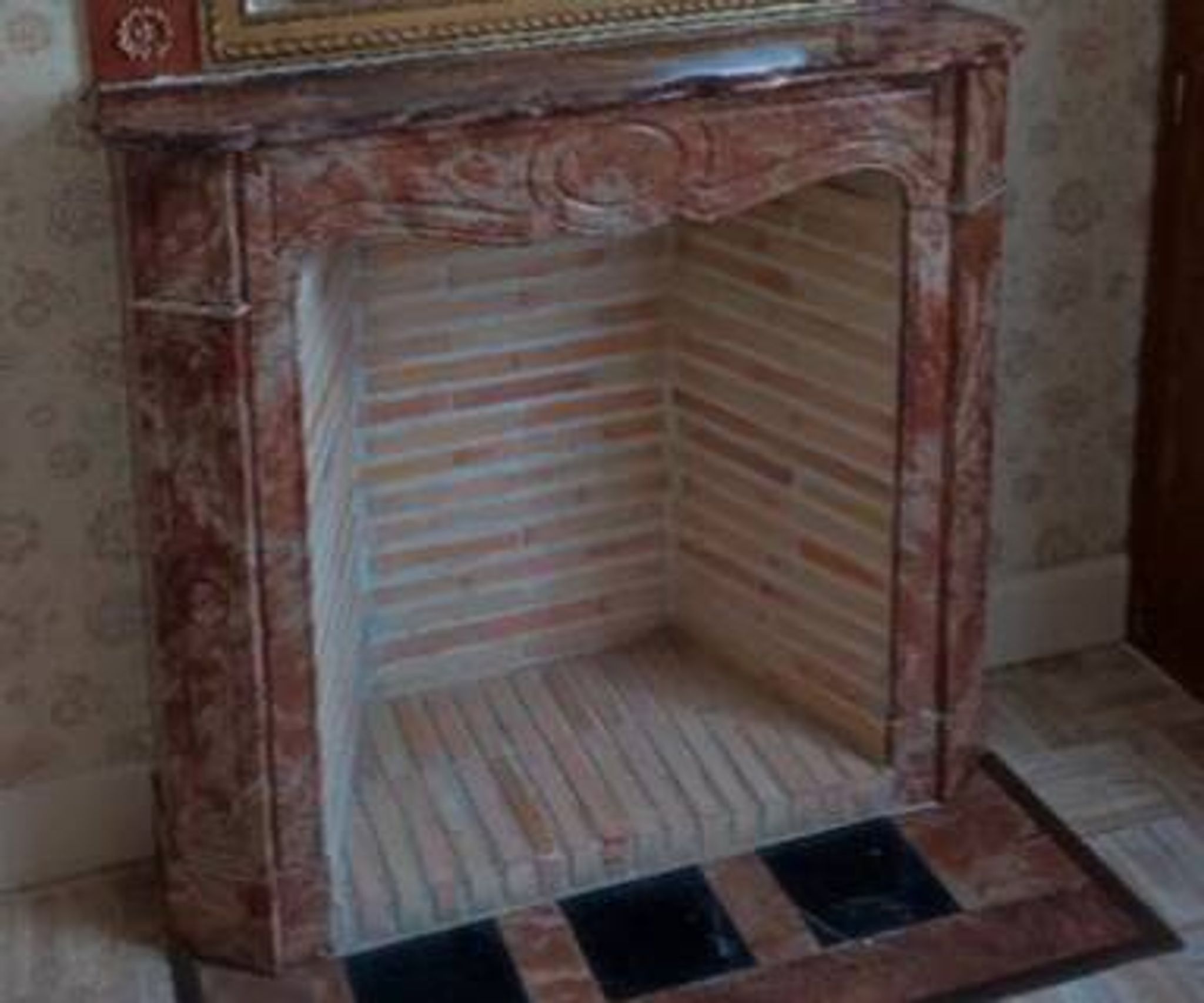 Pompadour fireplace in pink marble