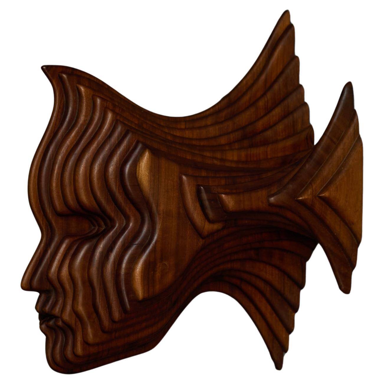 Sculptural carved wooden mask wall panel, France, 1970s
