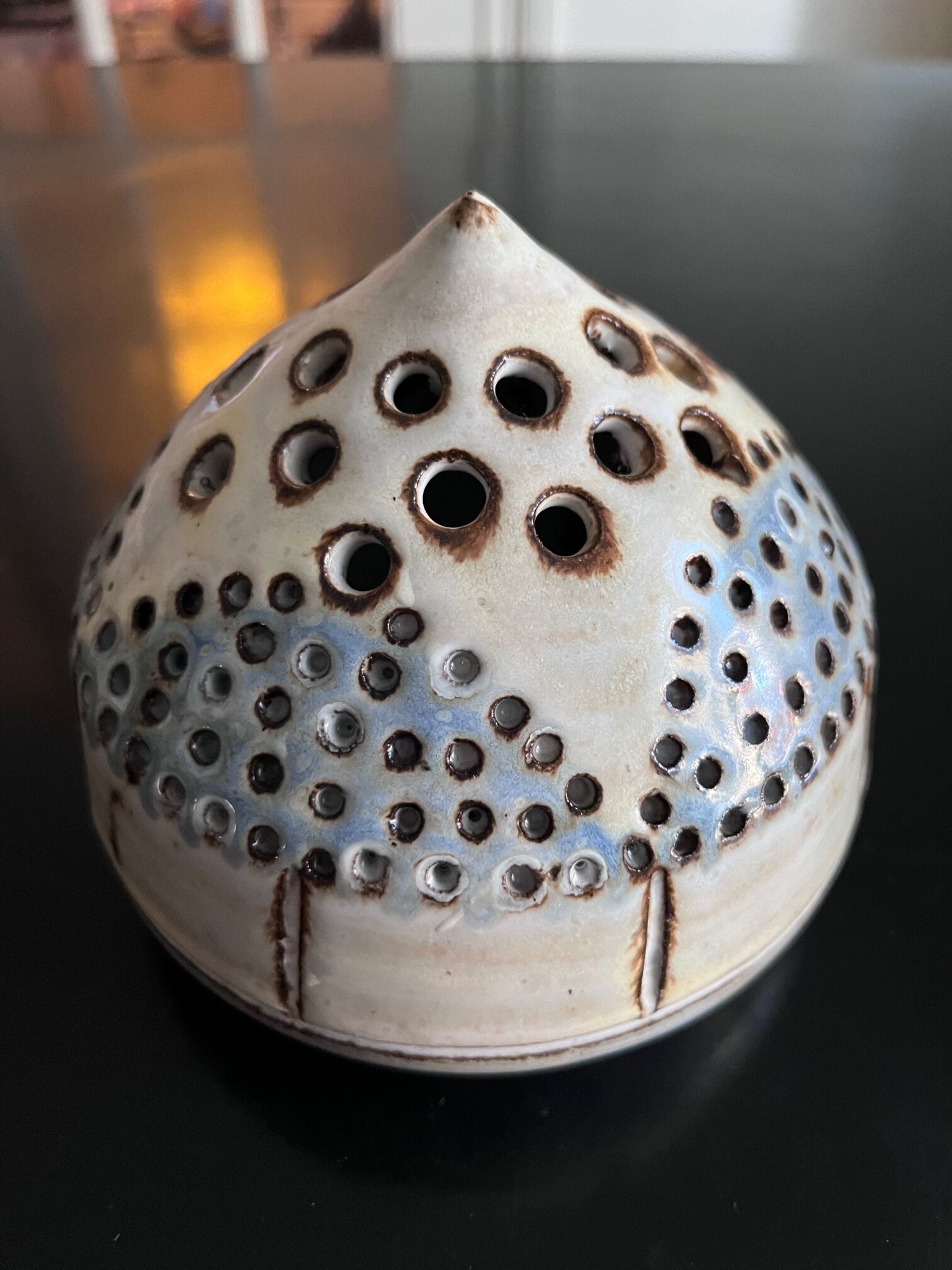 Ceramic flower pique at the old mill