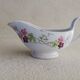 Iron earth sauce boat with floral pattern
