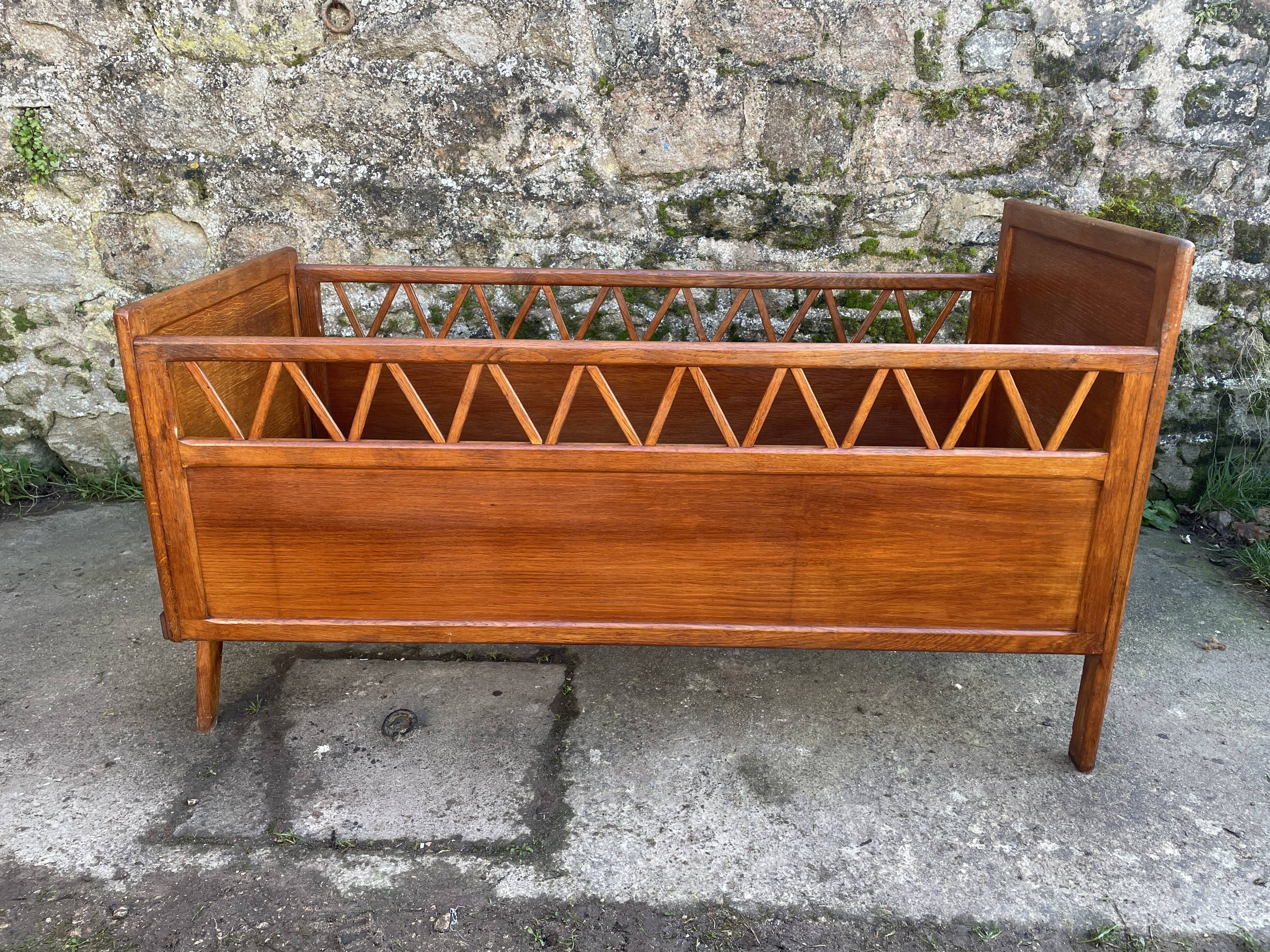 Handmade children's bed with compass feet 1950