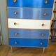 5-drawer wooden and formica chest of drawers Meredew Furniture