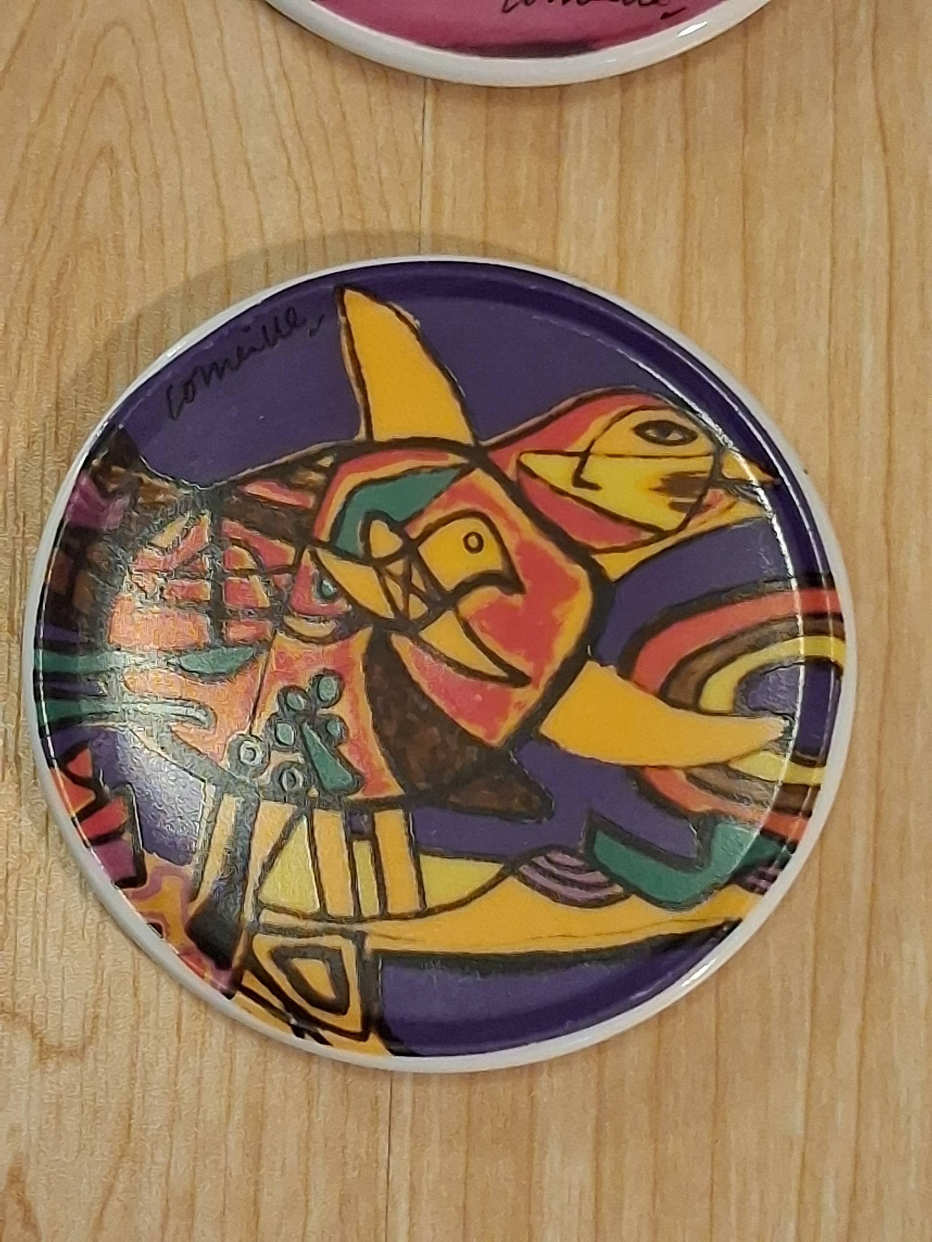 Coasters by the artist Guillaume Cornelis, known as Corneille, from 2001.