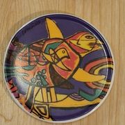 Coasters by the artist Guillaume Cornelis, known as Corneille, from 2001.