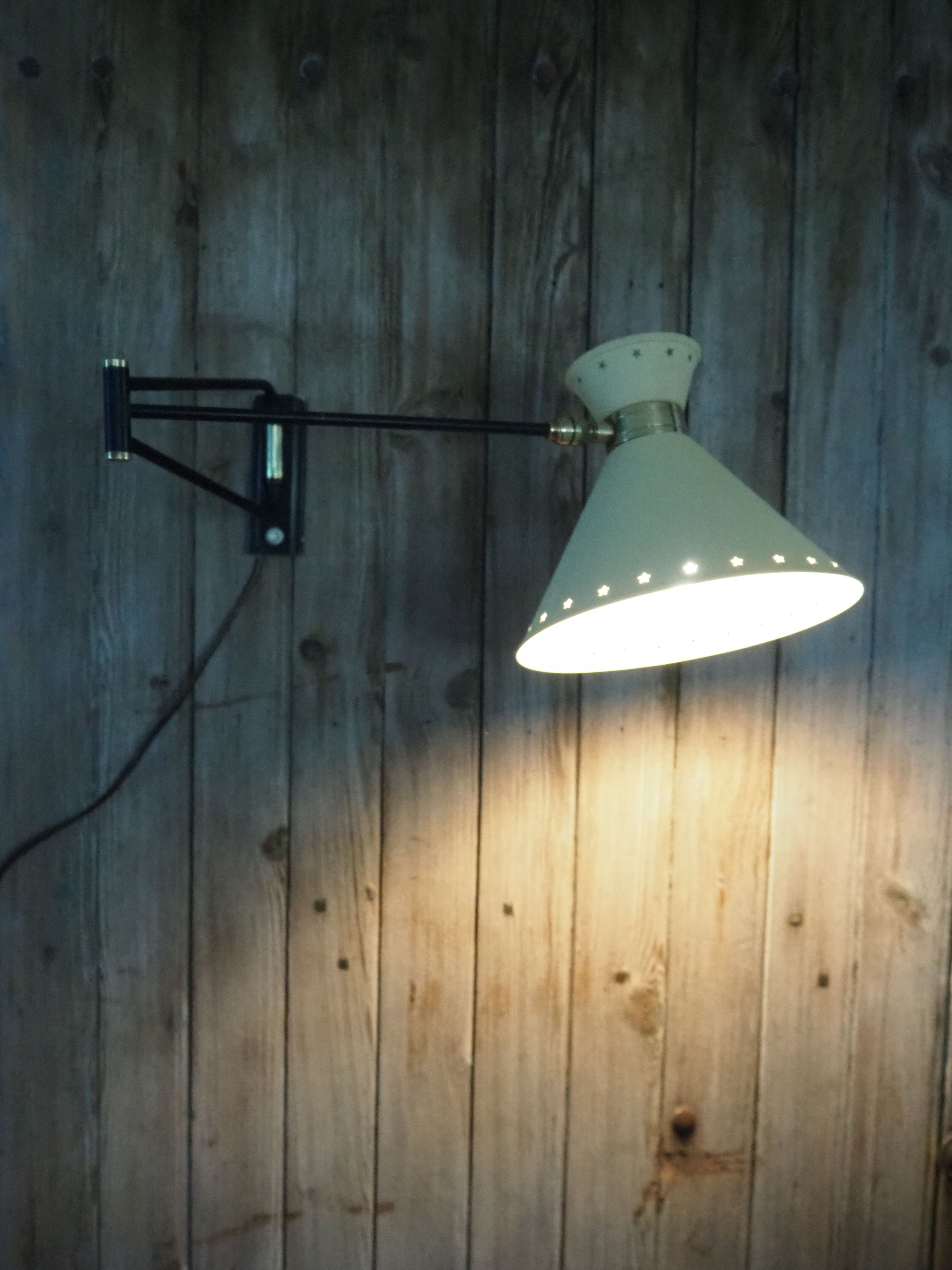 Diabolo articulated wall lamp by designer René Mathieu
