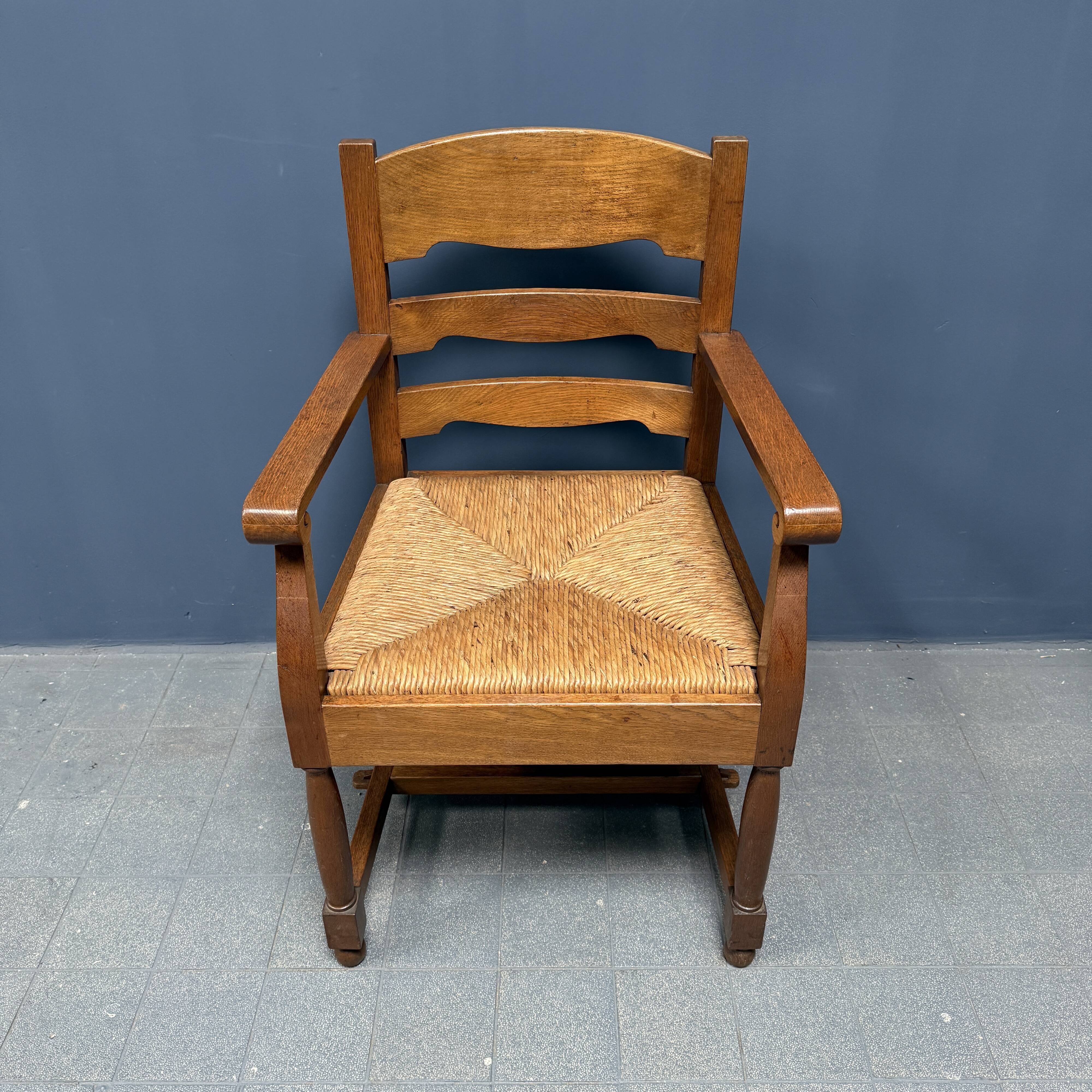 Set of two Dutch oak armchairs with rush seats