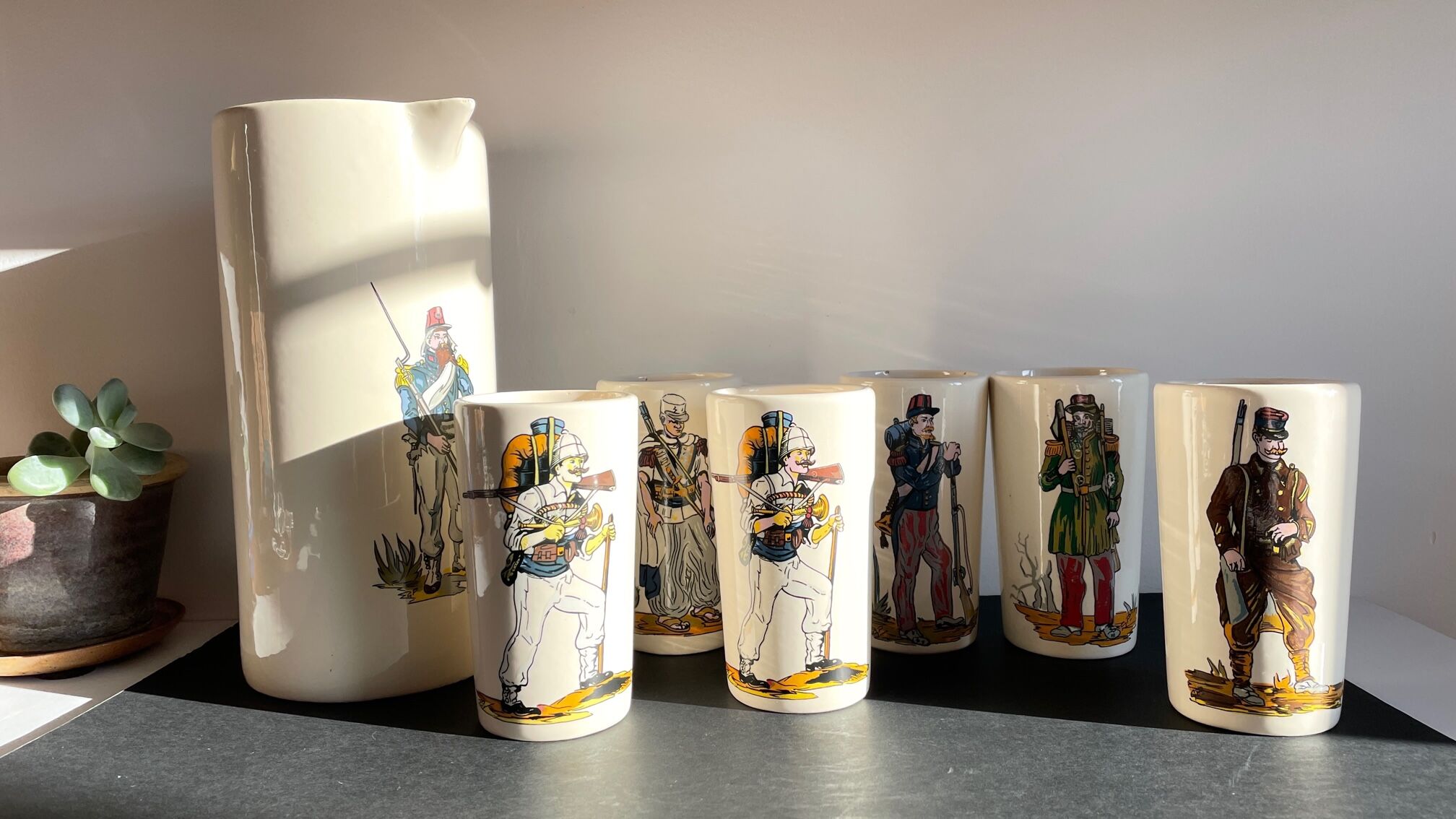 Orangeade service to vintage ceramic soldiers