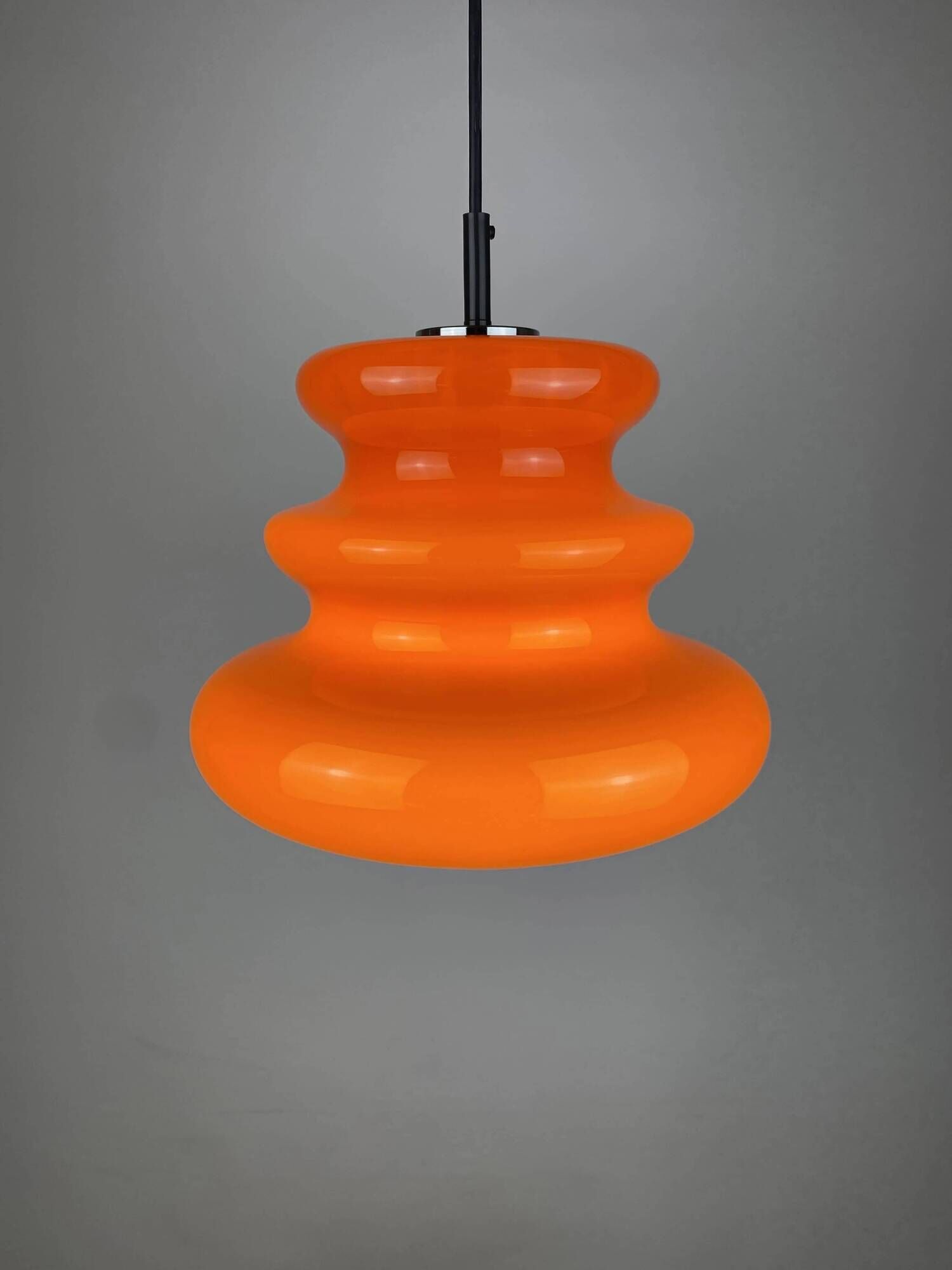 Bright orange glass pendant light AH 1 by Peill and Putzler 1960