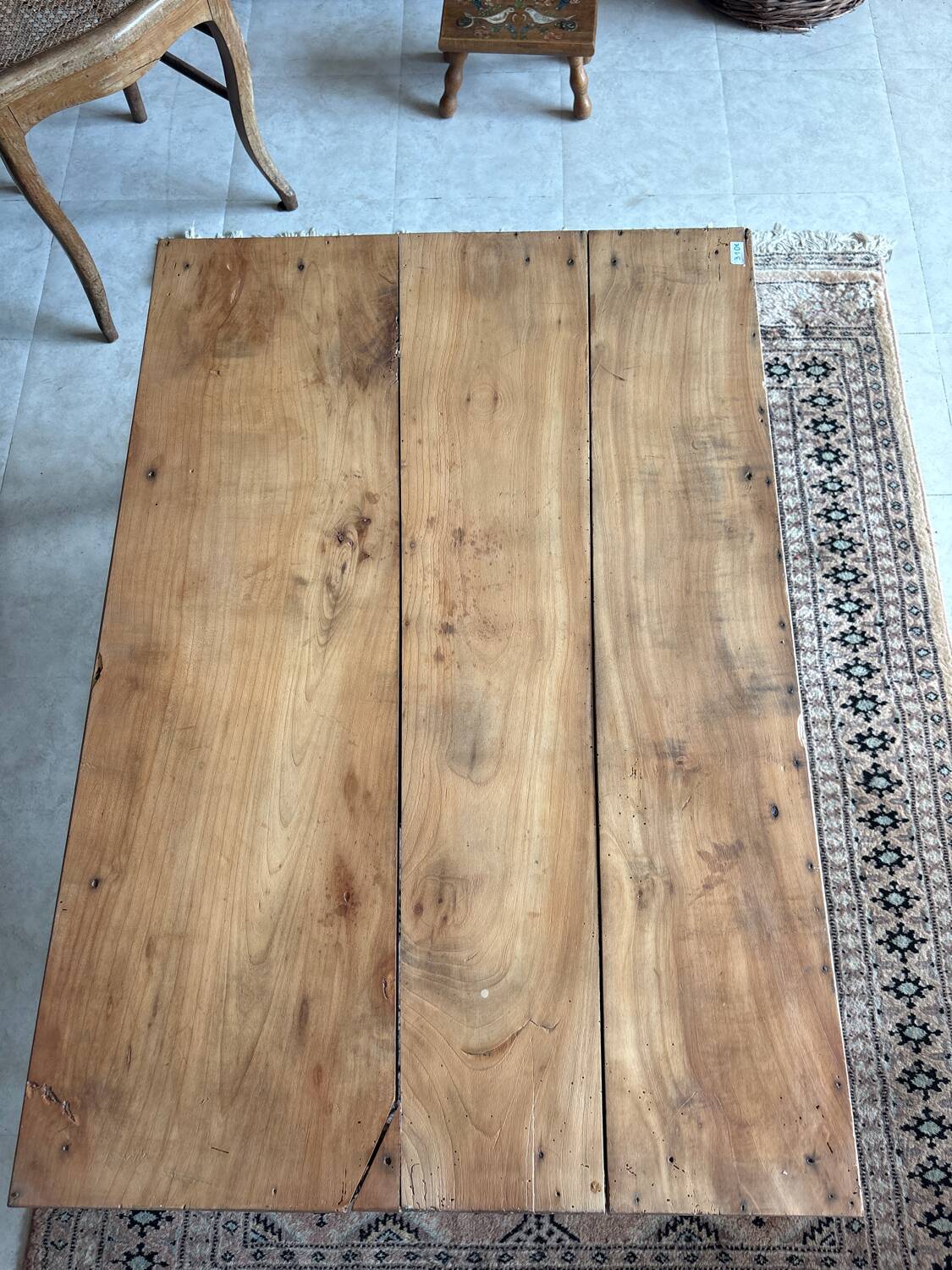 Coffee table with sandblasted top and painted legs.