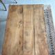 Coffee table with sandblasted top and painted legs.