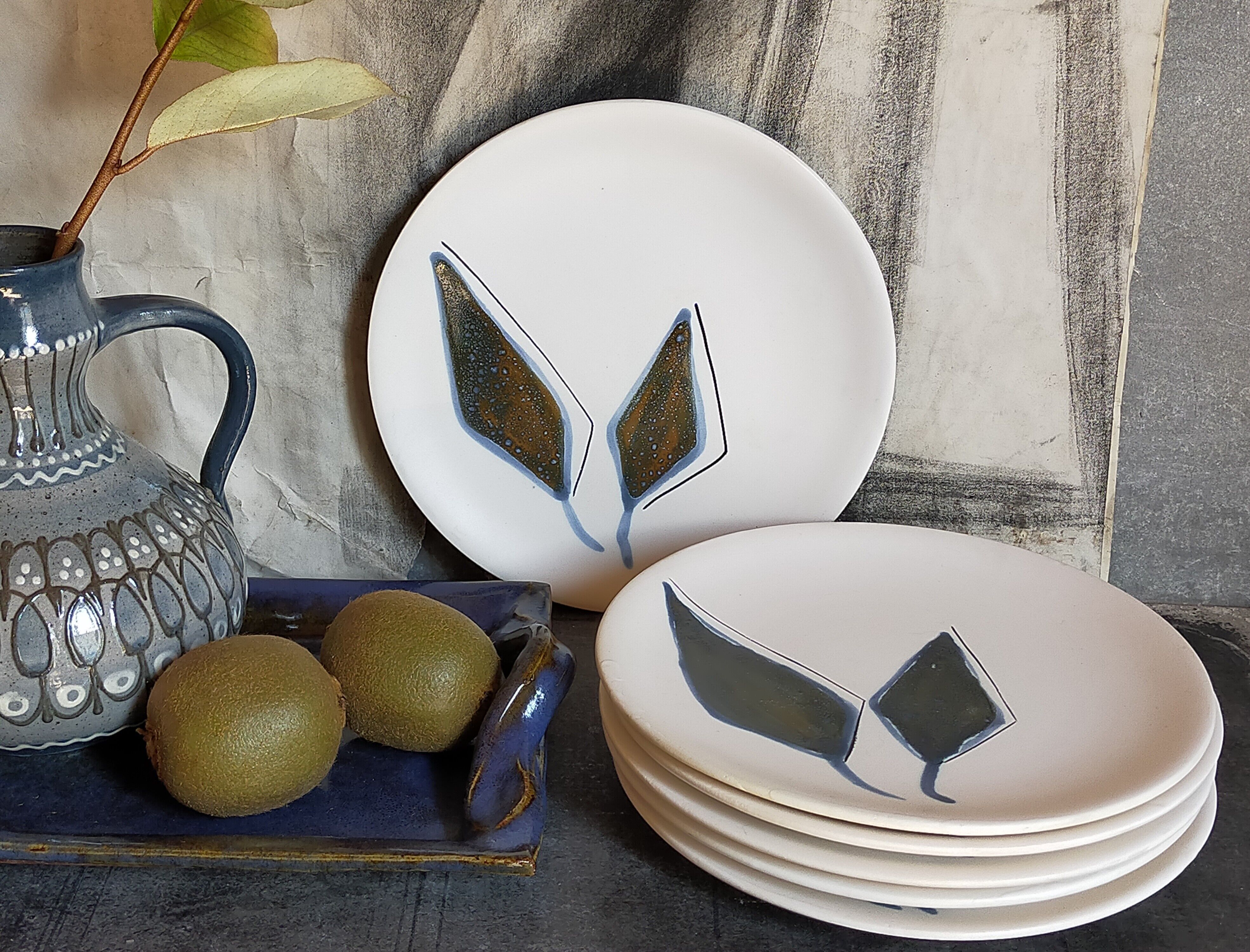 Six ceramic plates with matt enamel 50s
