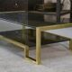 Designer coffee table with brass structure and black smoked glass, 1970s