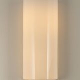 Pair of large opaline glass wall lights in brass designed by Limburg, Germany.