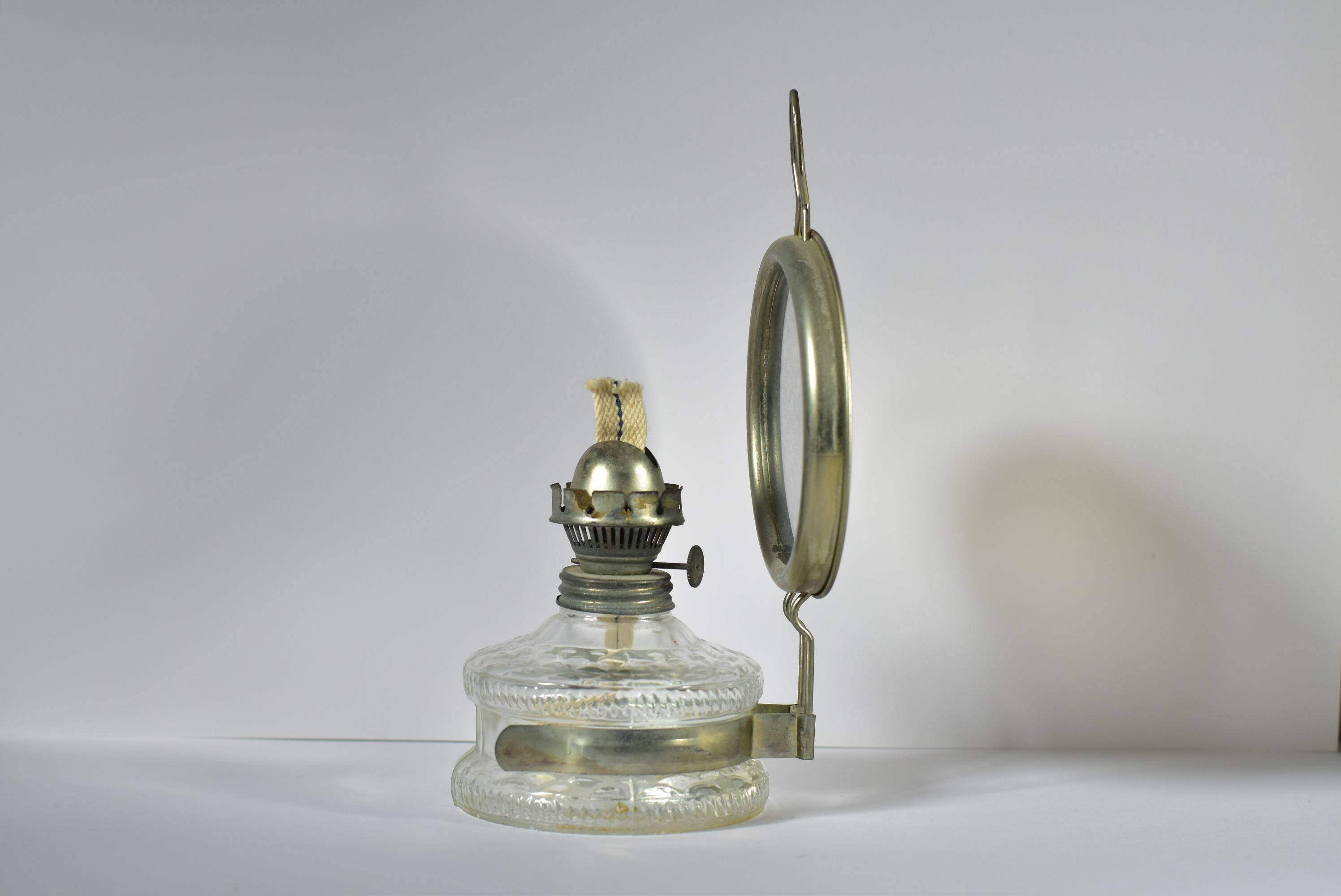 Vintage kerosene lamp with reflective mirror