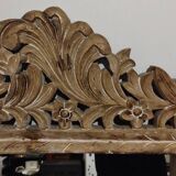 Mirror with its openwork frame