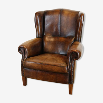 Dark brown leather club chair