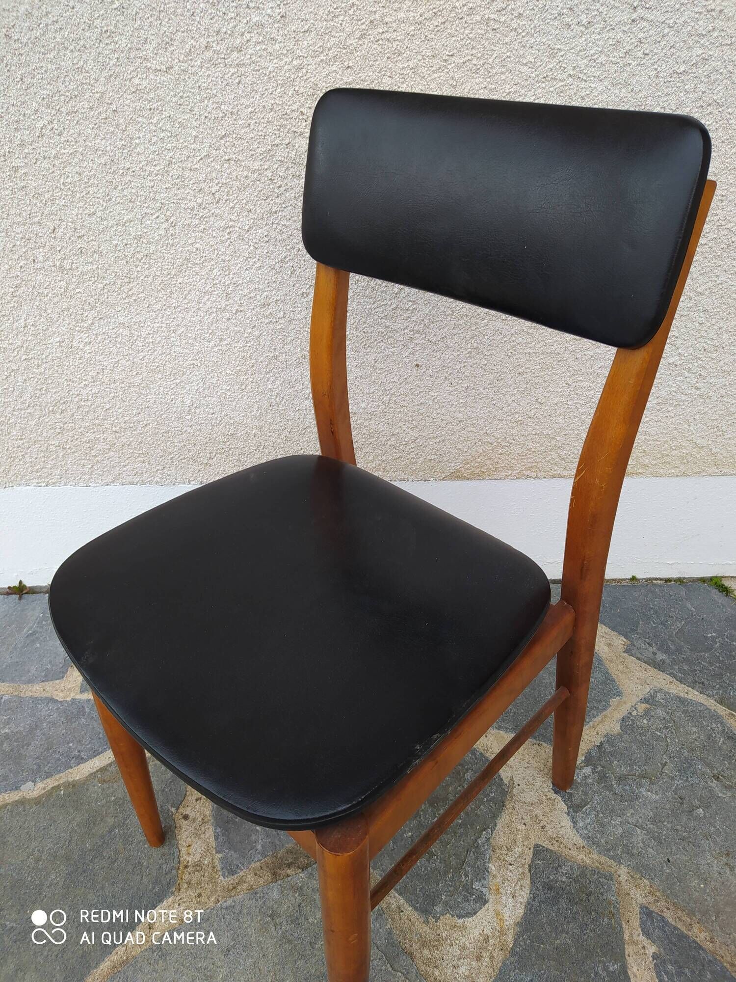 Vintage Scandinavian Danish chair in teak and black skai
