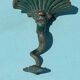 Antique candlestick base – stylised marine fish in patinated bronze