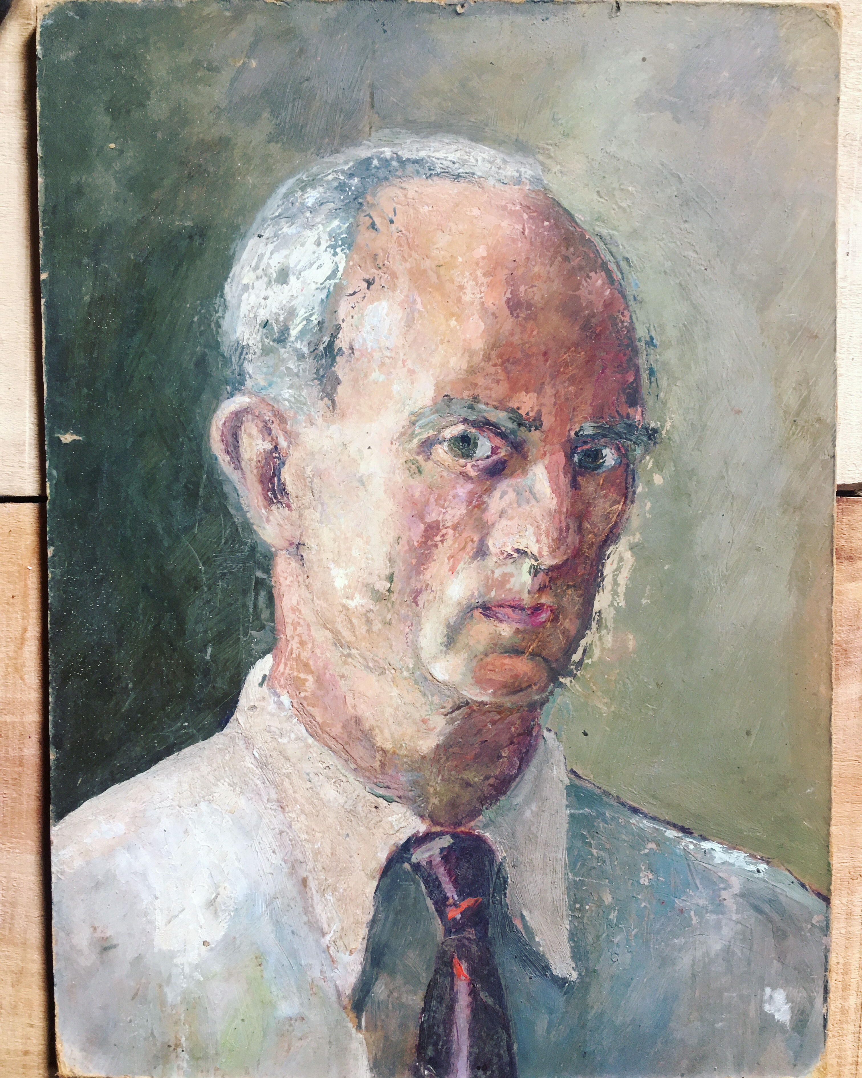 Portrait of a man with oil painting. Oil on Isorel. Oil painting. 1930s. Vintage portrait.