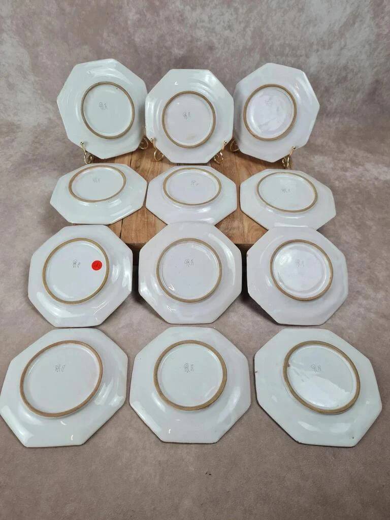 Set of 12 small antique plates by Alfred Renoleau, different designs.