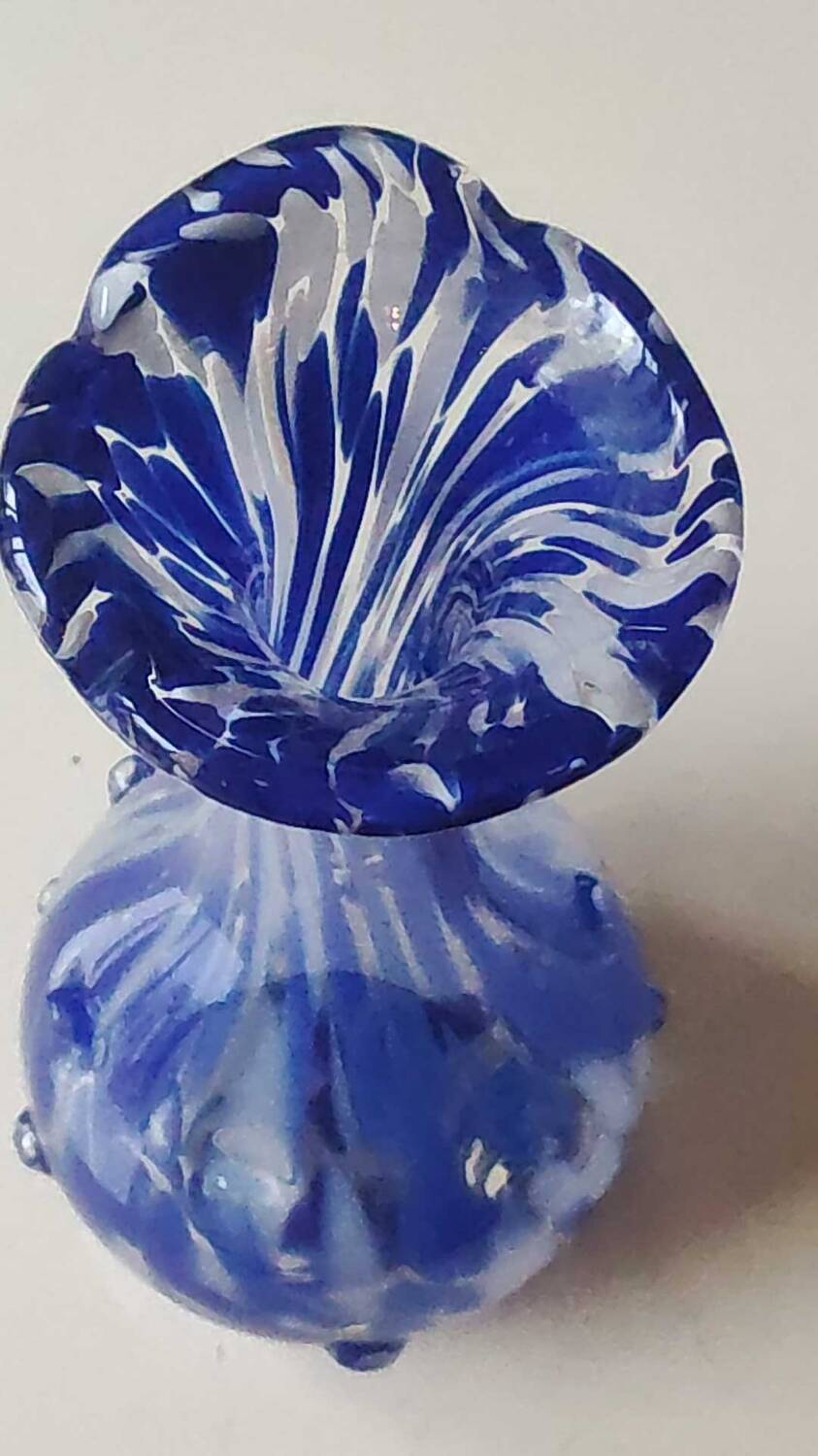 Murano style floral vase. Corolla neck, speckled cobalt blue & white. Dim 24 x 10 cm