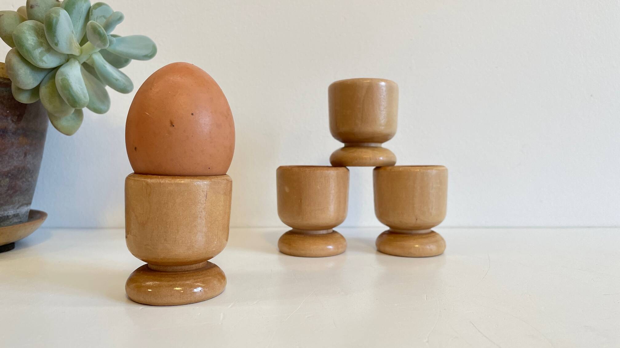 4 vintage turned wooden egg cups