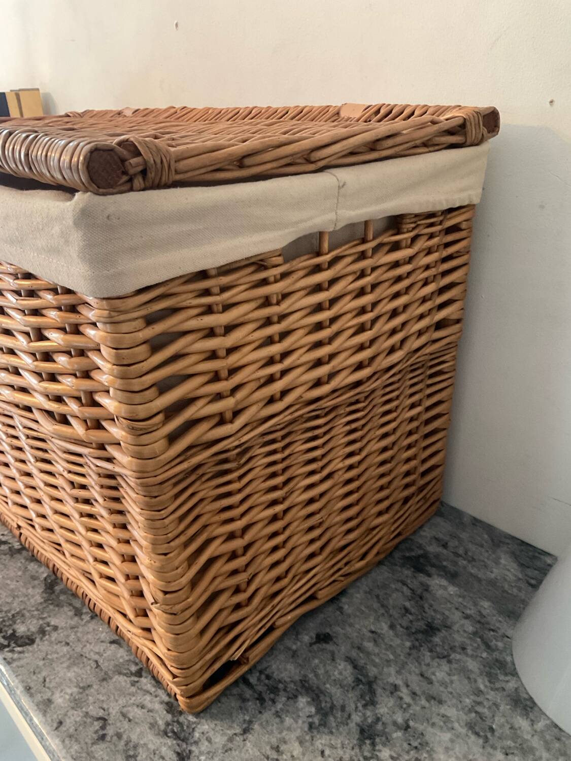Woven wicker vintage suitcase
