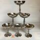 6 footed bowls with silver frieze in metal for ice.