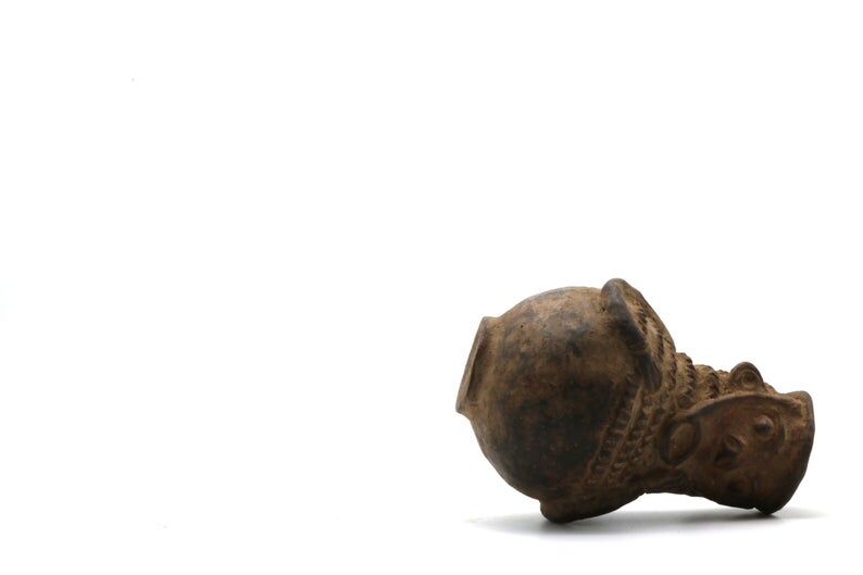 Mangbetu pottery container with hermaphrodite ancestor