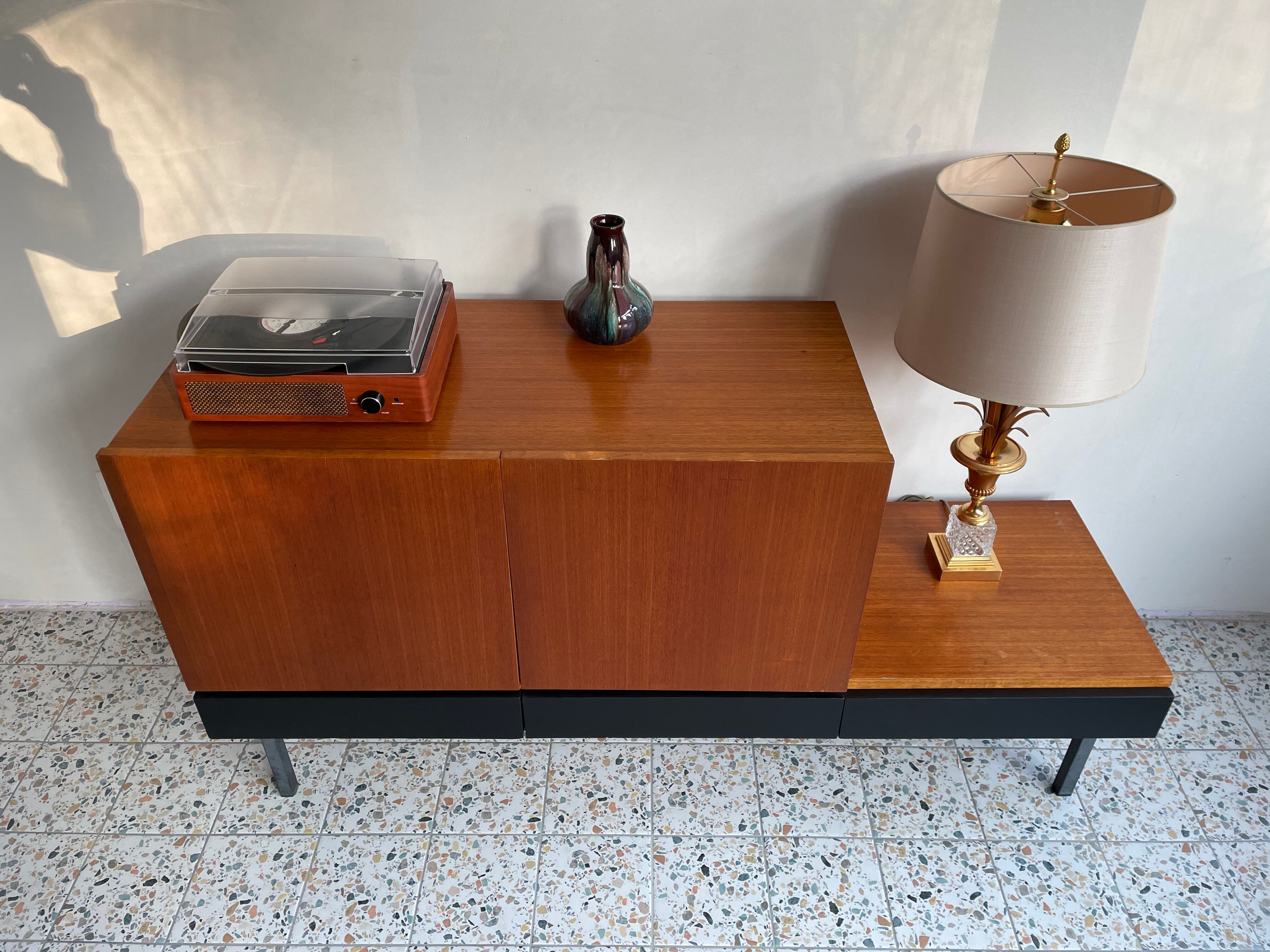 Asymmetrical vintage teak row