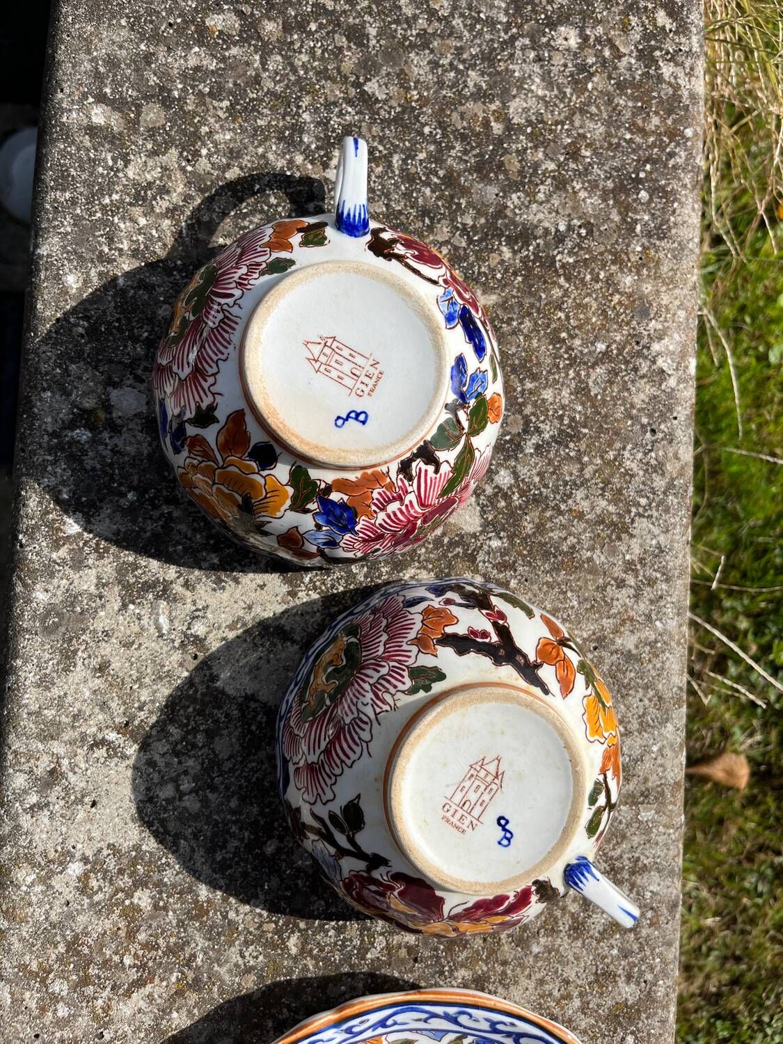 Gien earthenware tea cups and saucers with peony decor