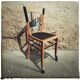 Set of mismatched bistro chairs