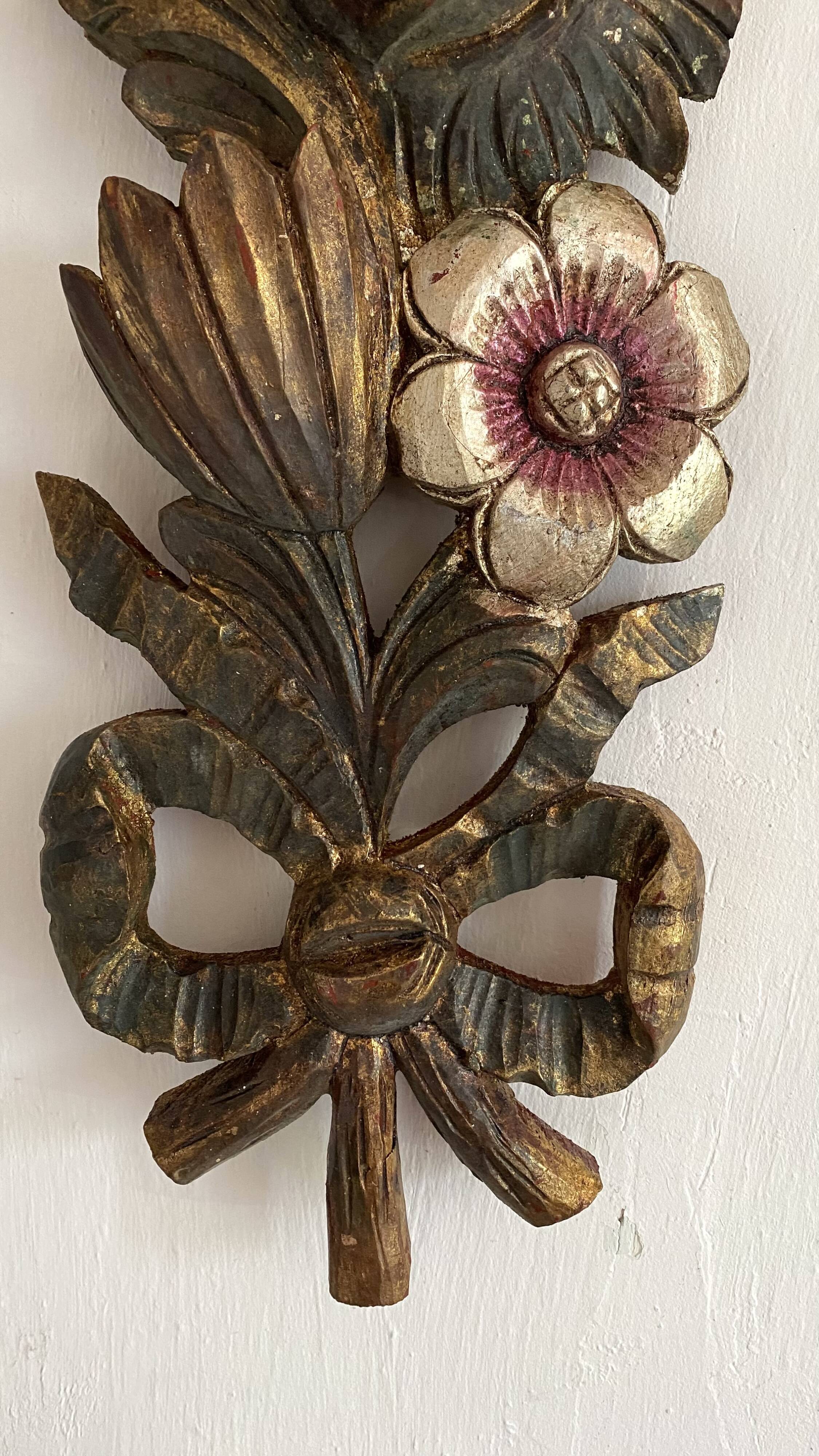 Decorative carved wooden ornament bouquet flowers and ribbon