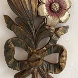 Decorative carved wooden ornament bouquet flowers and ribbon