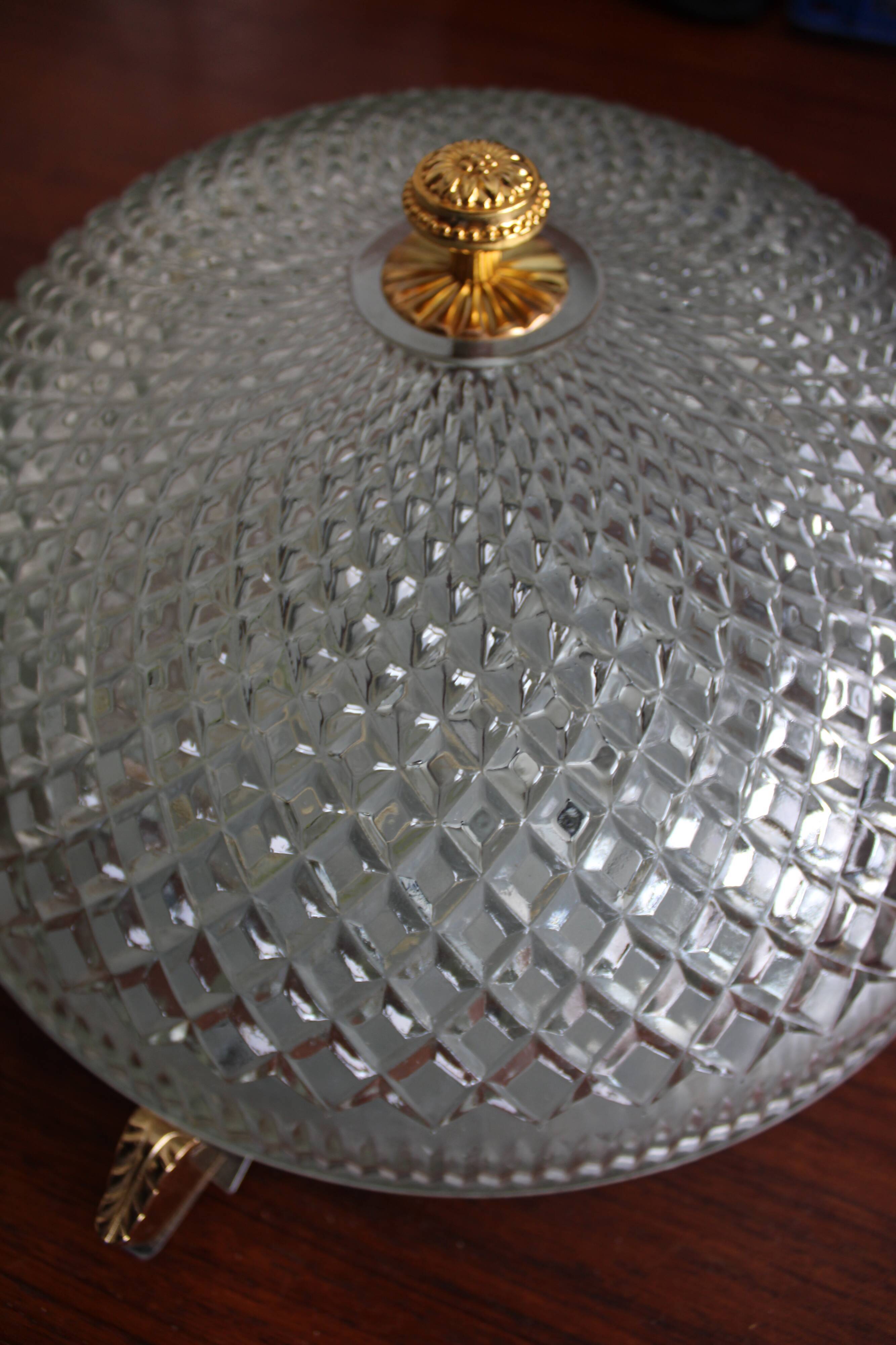 Brass ceiling light with moulded glass