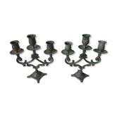 Pair of candlesticks in green-grey patinated metal