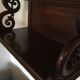 Carved wooden wall shelf.