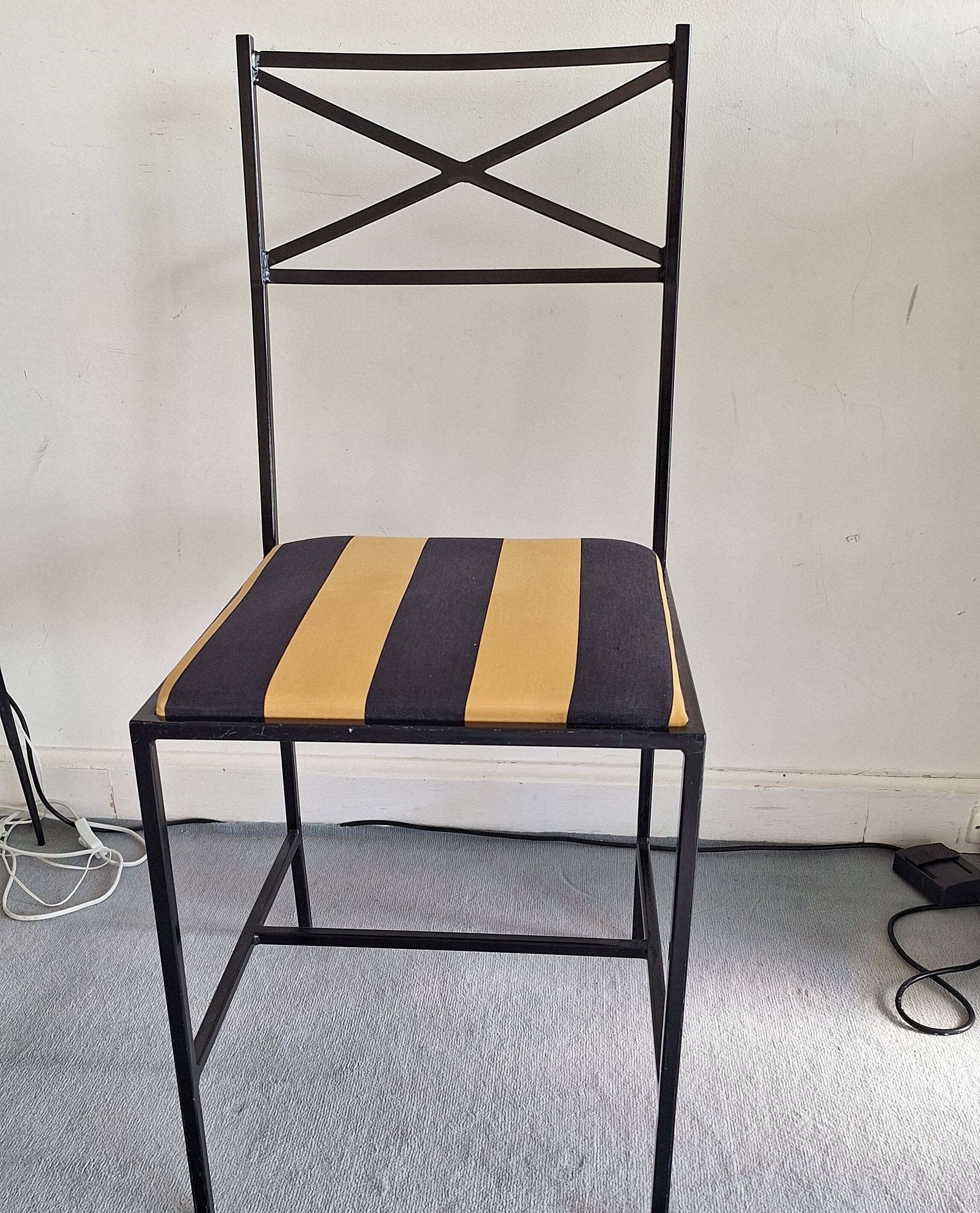 4 padded metal chairs