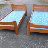 Pair of beds with twin box springs attributed to Maison Regain elm burl