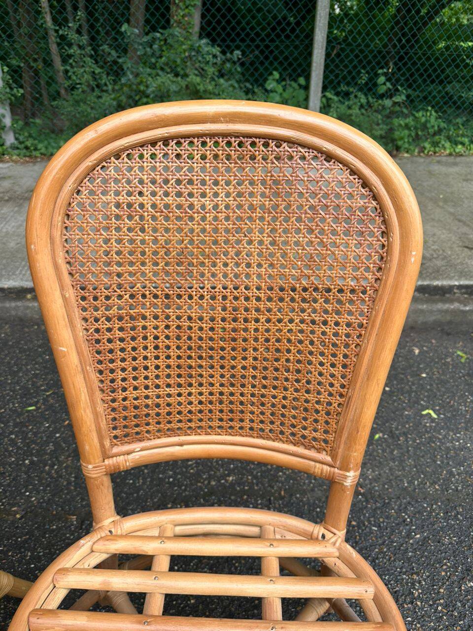 2 rattan and caned chairs in colonial bistro style from the 1990s.