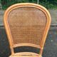2 rattan and caned chairs in colonial bistro style from the 1990s.